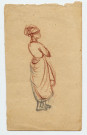 Femme coiffée d'une tête madras, bras croisés